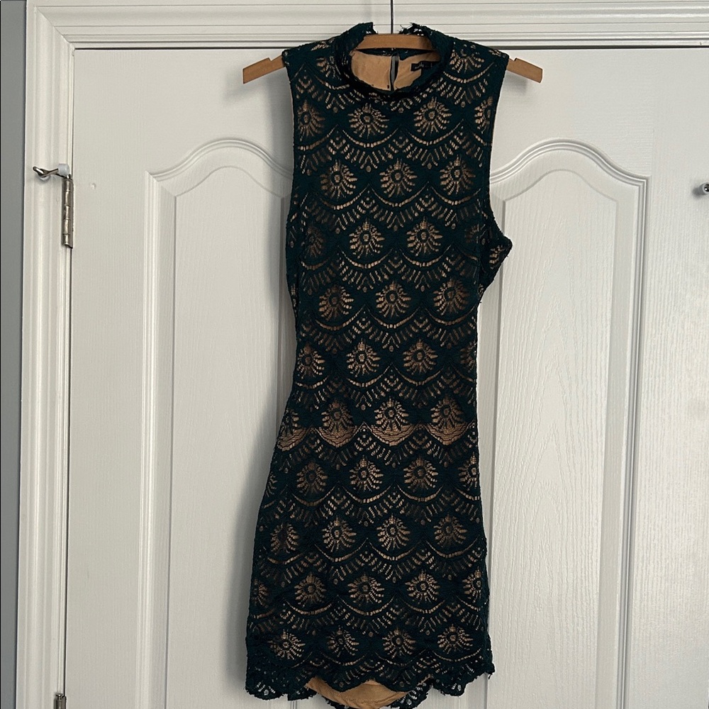 Chic Dark Green Lace Sleeveless Mini Dress with open back by Maddy K